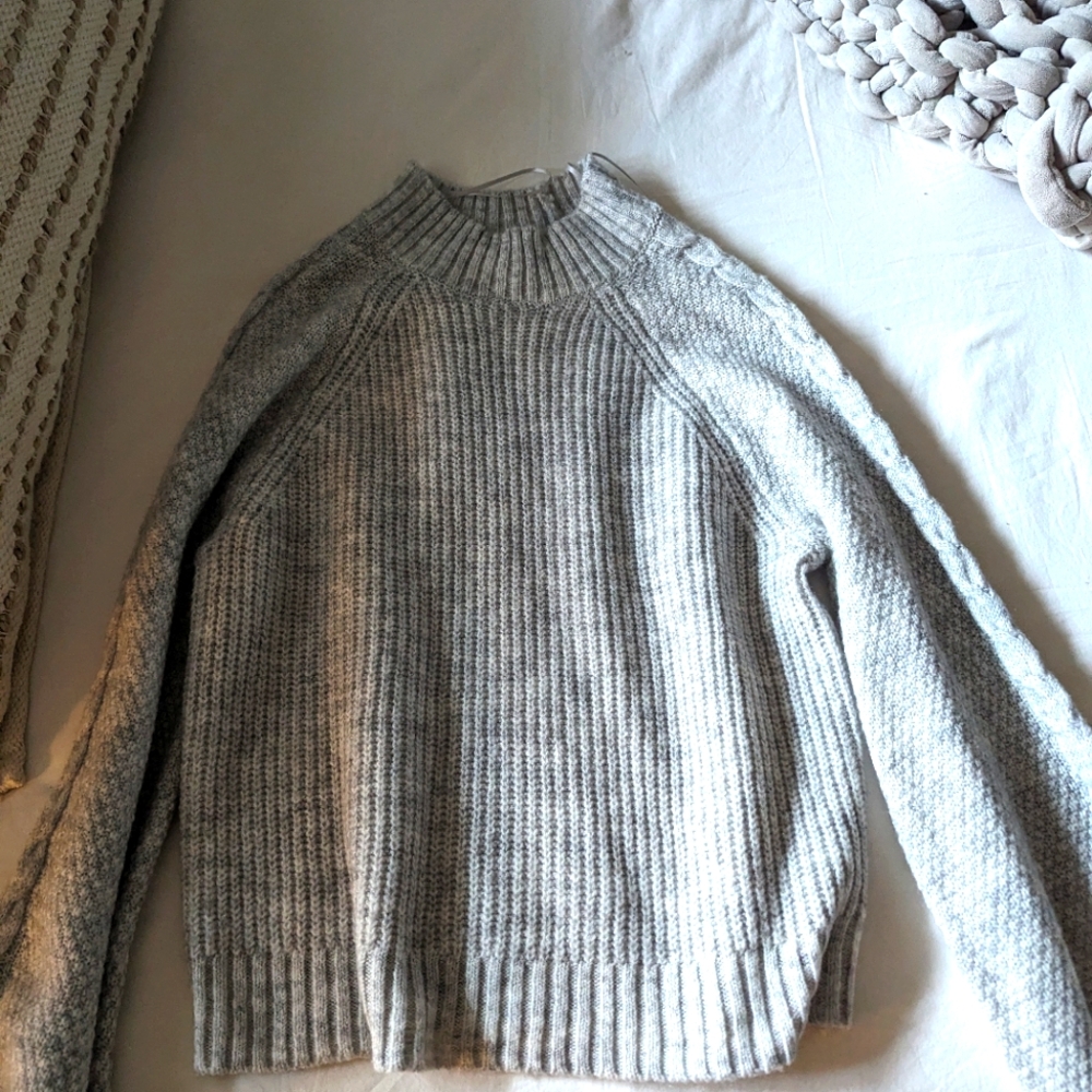 Gray sweater, size L.